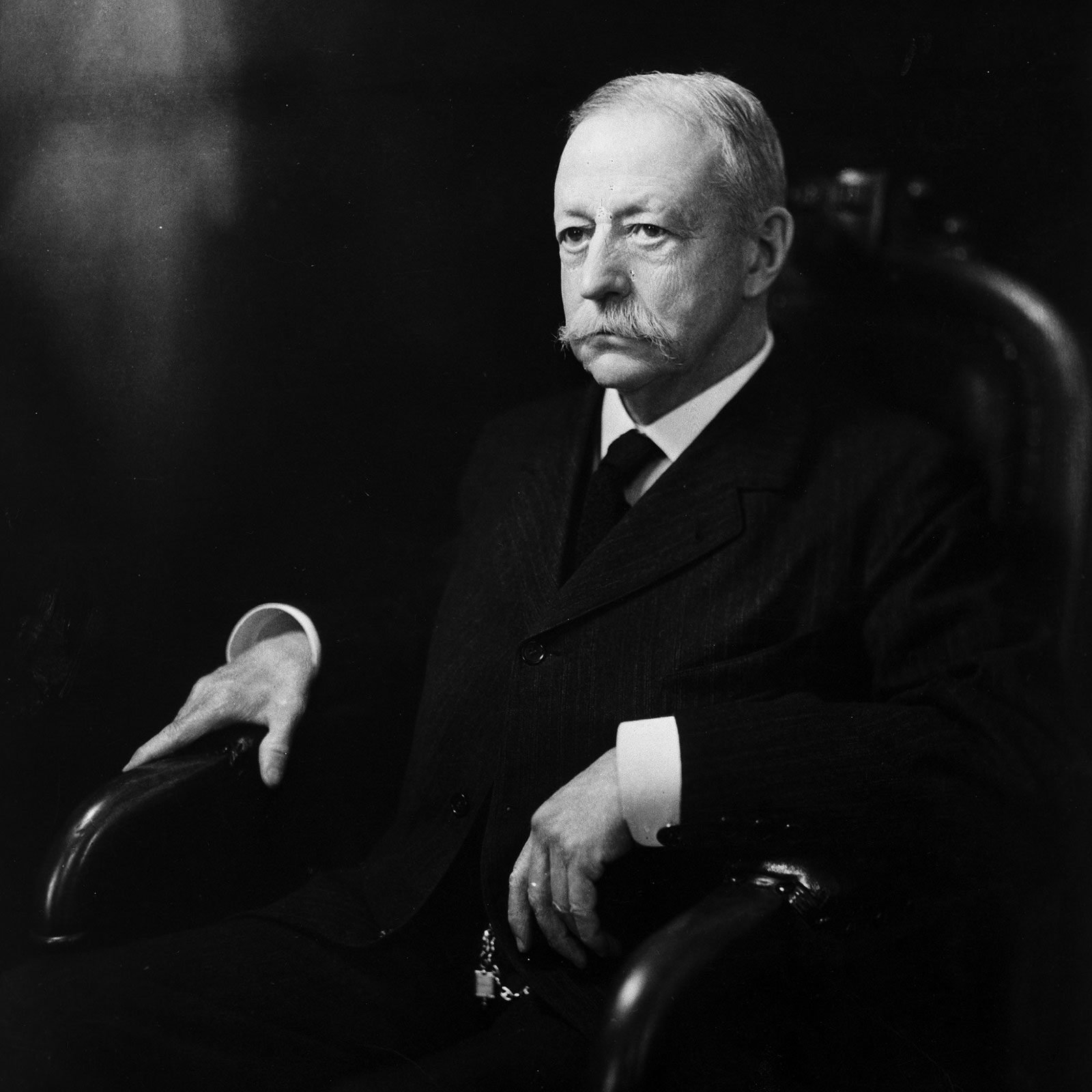 A photograph of A. Lawrence Lowell sitting in a chair